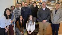 Mor Lab team members wish leaving member good luck in farewell celebration.